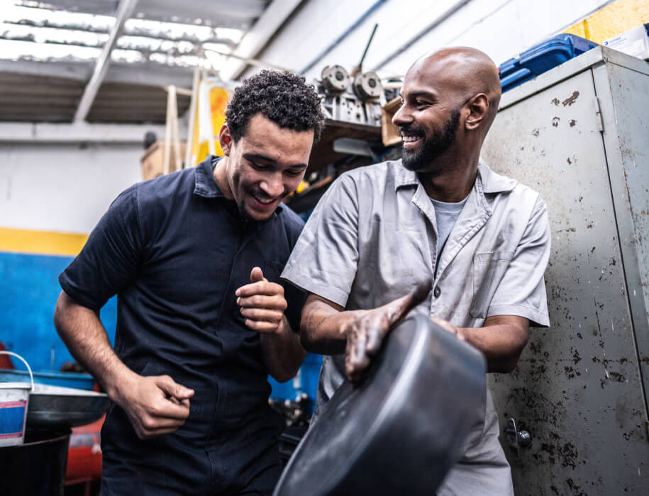 two auto shop workers